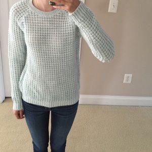 Teal winter sweater.