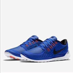 neon blue nike running 5.0