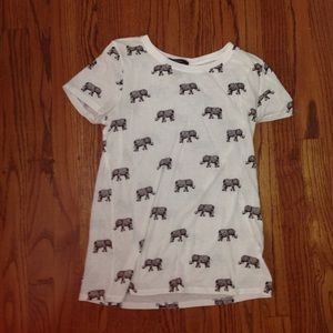 A white and black elephant printed shirt.