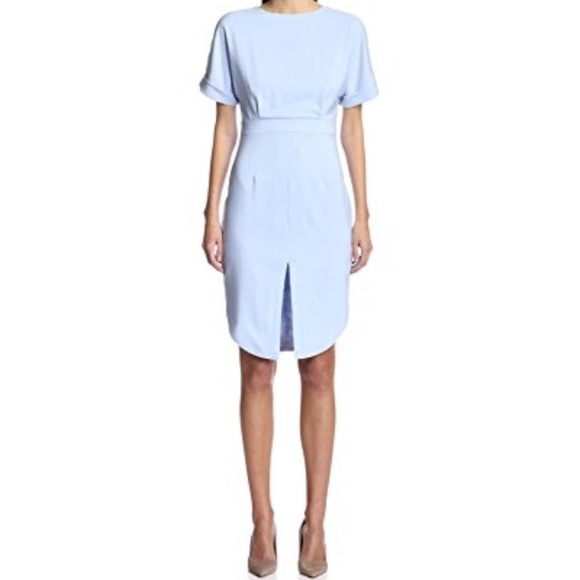 Ivory white slit-front shirt dress.
