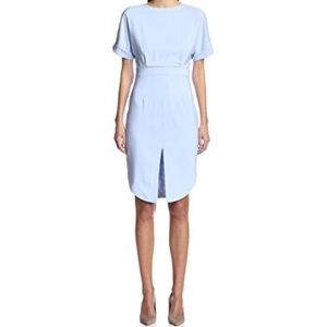 Ivory white slit-front shirt dress.