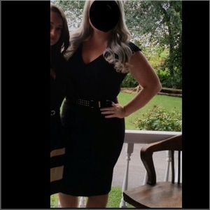 Black pencil dress with gold hardware