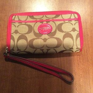 Pink and Tan Coach Wristlet