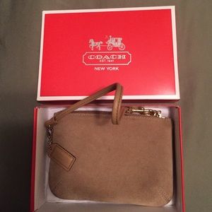 Coach beige wristlets