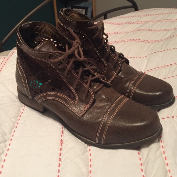 Brown ankle lace up boots with lace sides