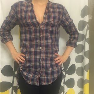 Pink and navy plaid shirt, ruching on the side.