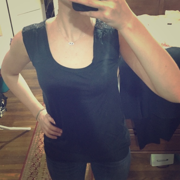 Sleeveless Express top with detailed shoulders