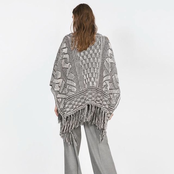 Zara Sweaters - ZARA BLACK AND WHITE FRINGE PONCHO Zara Sweaters - ZARA BLACK AND WHITE FRINGE PONCHO