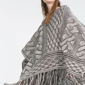Zara Sweaters - ZARA BLACK AND WHITE FRINGE PONCHO Zara Sweaters - ZARA BLACK AND WHITE FRINGE PONCHO