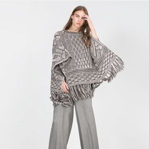 Zara Sweaters - ZARA BLACK AND WHITE FRINGE PONCHO Zara Sweaters - ZARA BLACK AND WHITE FRINGE PONCHO