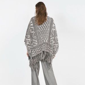 Zara Sweaters - ZARA BLACK AND WHITE FRINGE PONCHO Zara Sweaters - ZARA BLACK AND WHITE FRINGE PONCHO