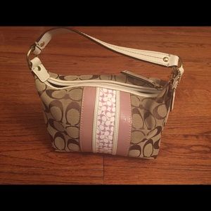 Small purple and white coach logo handbag
