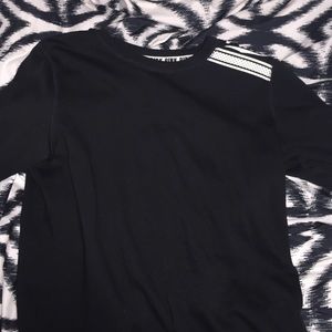 black sweater from pink