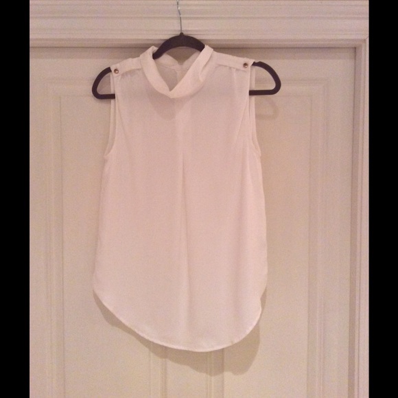 Sleeveless blouse - has never been worn