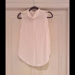 Sleeveless blouse - has never been worn