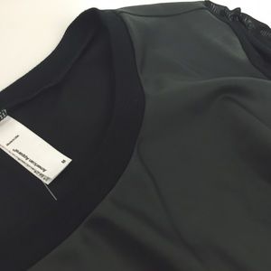 Faux leather sweat shirt style top