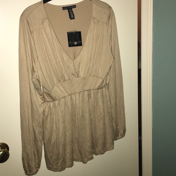 Long sleeved tan blouse