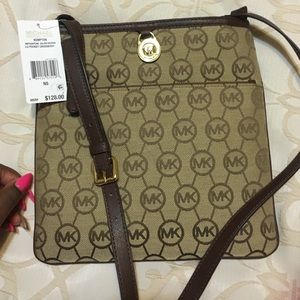 Authentic Micheal Kors large pocket crossbody
