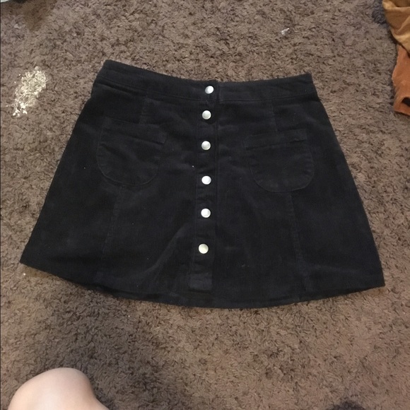 Black Bruce button skirt