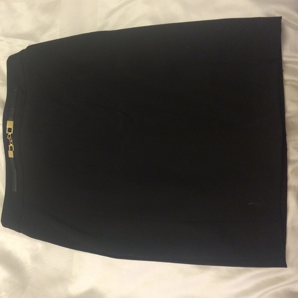 Black pencil skirt with gold buckle