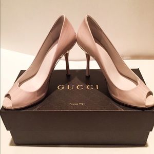 Gucci Cream peep toe heels.