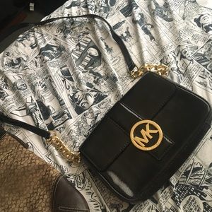 Michael Kors black & gold mini bag