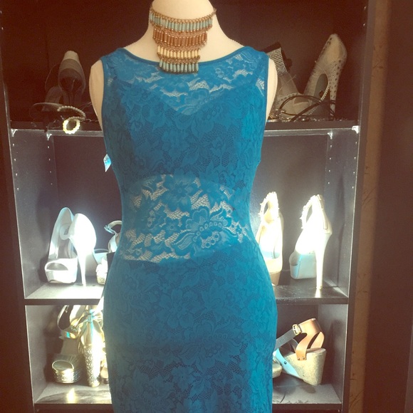 New with tags turquoise Bebe dress