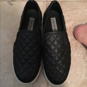 Black quilted Steve Madden sneakers