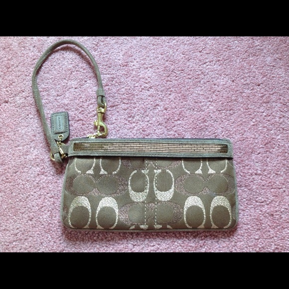 Coach Handbags - Brown and gold Coach wristlet
