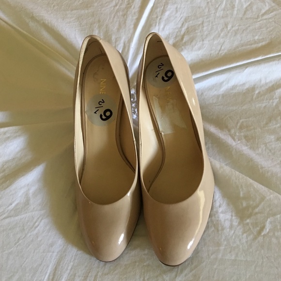 Nude patent heels