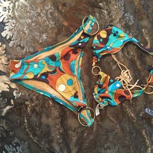 Vitamin A Bikini. Fits more like a medium.