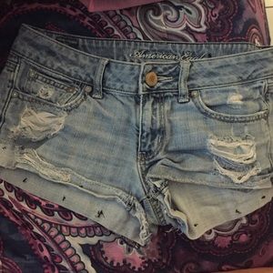 Light denim distressed shorts