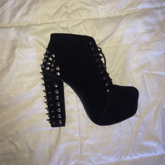 Black stiletto booties. Never worn.
