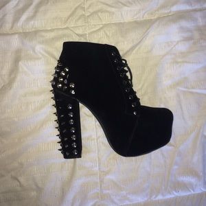 Black stiletto booties. Never worn.