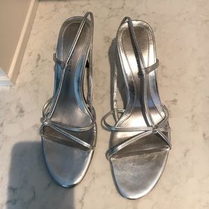 Nine West silver strappy leather shoe.