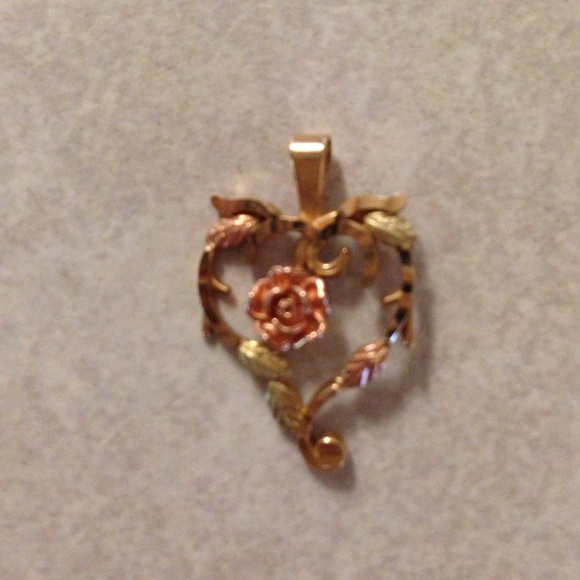 Uniquely colored heart/rose pendant