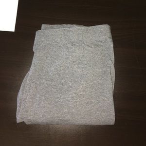 Dark Grey Nike Legging with black swoosh on ankle