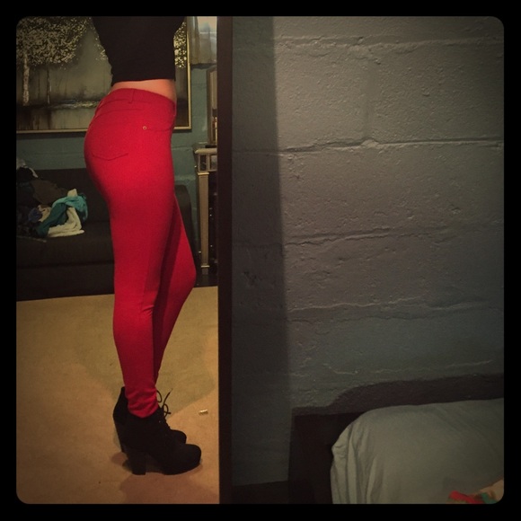 Red, high waisted jeggings. Size small.
