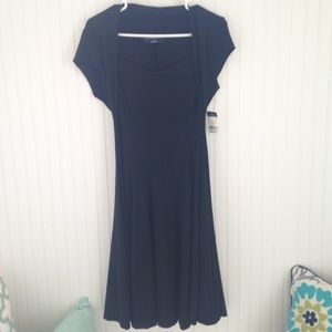 Modern black knee length dress