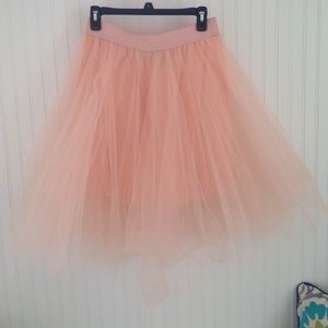 Knee length pink puffy skirt