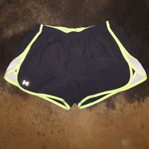 Gray and neon green Under Armour athletic shorts