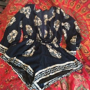 Adorable beachy plunge neck romper