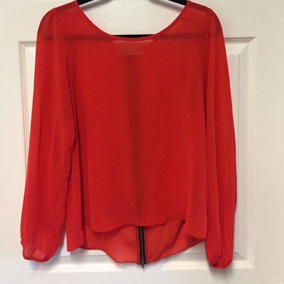 Sheer red blouse