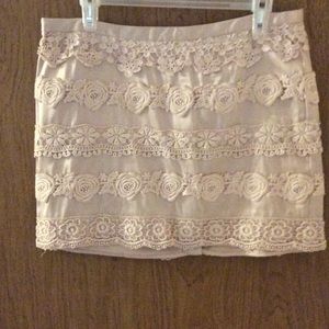 Pink miniskirt with flower lace detail