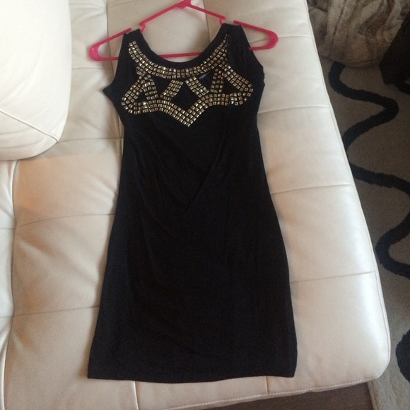 Black dress with studs and cutouts - Picture 1 of 2