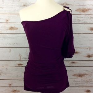 One shoulder top. Very sexy.