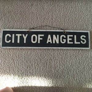 Brandy Melville wood sign