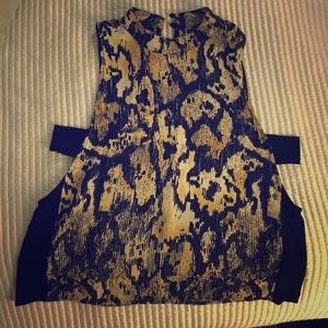 Fun and flirty top with cut out sides.