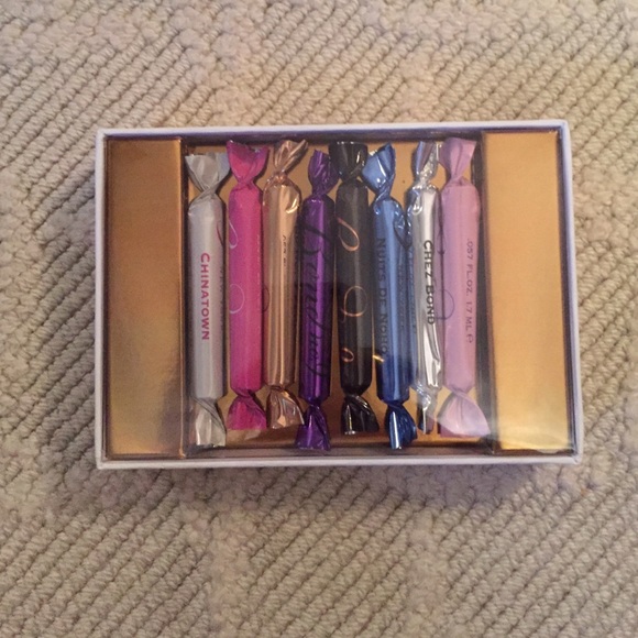 Bond Mini Perfumes, Vera bag, and large perfume