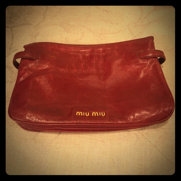 Authentic MIU MIU red clutch